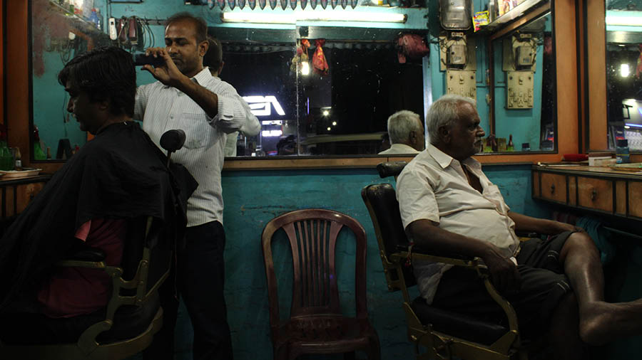 Ramesh and his father, Jawahar Thakur, built a saloon from a roadside chair