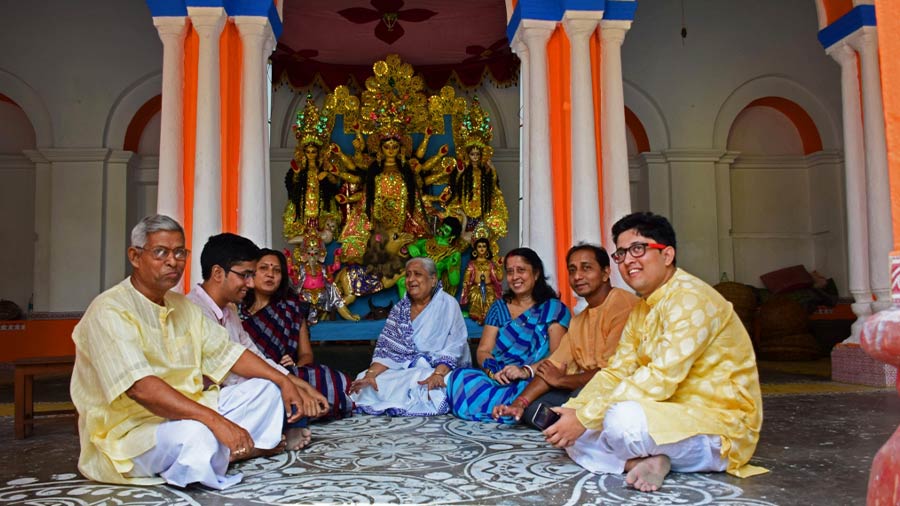Andul Dutta Chaudhuri family members in front of their goddess at their ‘thakur dalan’