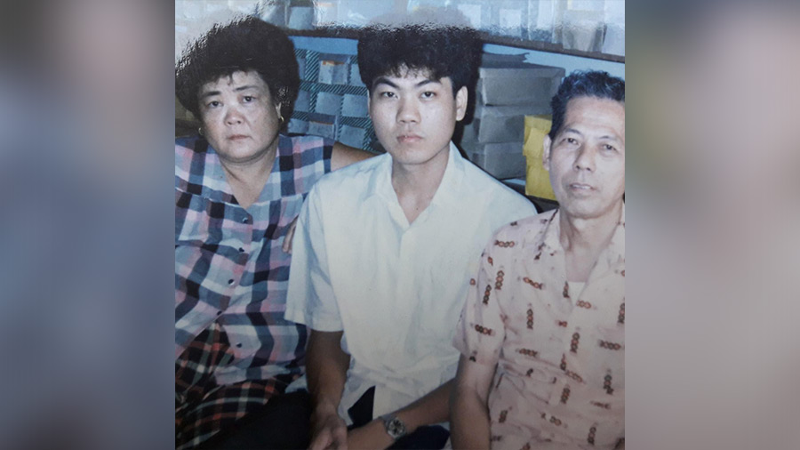 Lin with his parents many years ago