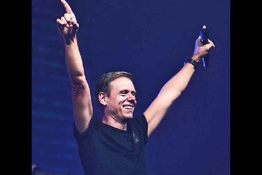 Striking his signature pose — both hands in the air while smiling — Armin played the crowd-favourite, Great Spirit