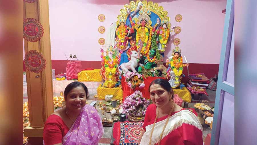 Women do not not participate in any rituals inside the temple sanctum during Durga Puja