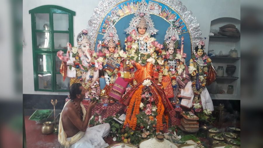 Usha Bishoyee’s family Puja in Digha has a sitting idol of Durga
