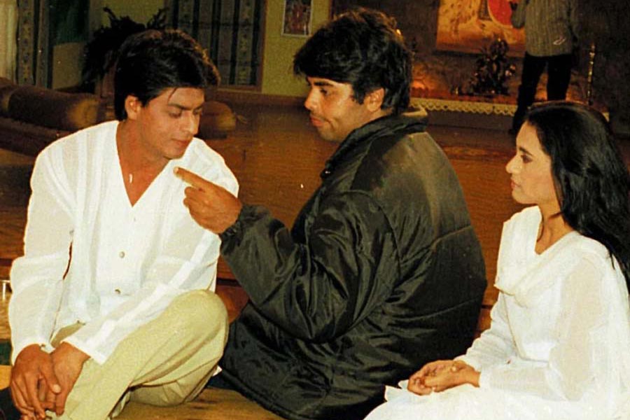 Shah Rukh Khan, Karan Johar and Rani Mukerji on the sets of Kuch Kuch Hota Hai.
