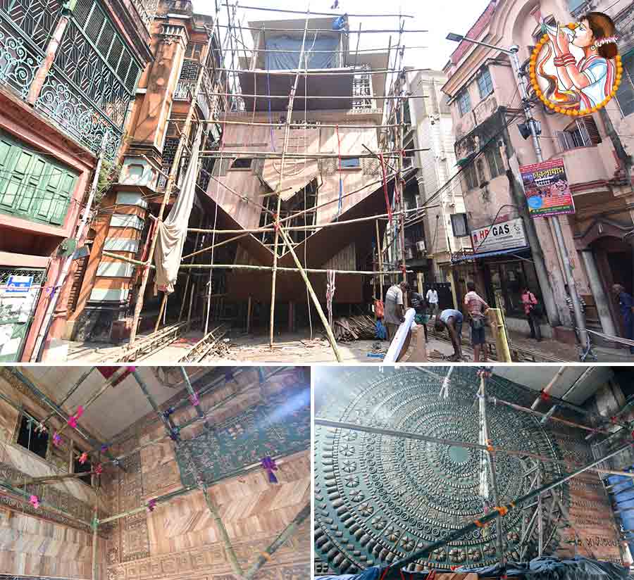 The theme for the Friends Union Durga Puja pandal, in its 52nd year, near Bagbazar Bata showroom this year is ‘Digbaji’ (Somersault). The club is proud to stick to its traditions even as the world goes topsy turvy. In its attempt to portray that, the puja has taken pieces of furniture, even a refrigerator, suspending from its ceiling. One if the side panels has an exquisite wheel kind of structure made of pieces of bamboo 