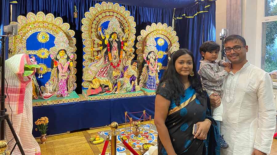 Rupam, Sayani and their son at a Durga Puja in Germany