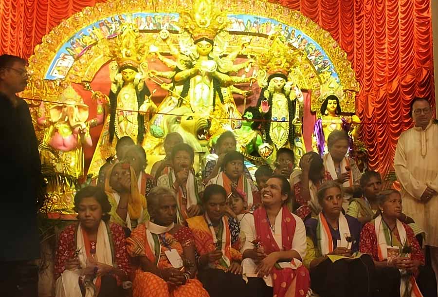 The 39th edition of Jhowtala Sarbajanin Durga Puja was inaugurated by differently abled and elderly women from MAHER 