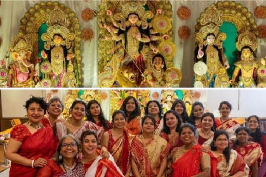 The idols of last year’s Durga Puja in Lausanne, Switzerland; (below) the organising team