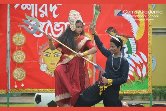 In a heartwarming demonstration of unity and cultural enthusiasm, the students of Gems Akademia International School commenced the much-anticipated Durga Puja celebrations with zeal and fervor. The event was steeped in the spirit of positivity, as echoed by the saying, "No matter how powerful evil may seem, good always holds the ultimate victory."  GAIS witnessed a grand gathering of students from both the Primary and Senior Segments who wholeheartedly participated in the celebrations. This year's theme, "Mahisasura Mardini," set the stage for a captivating performance that took everyone on a journey through the epic tale.  The students showcased their artistic talents through an enthralling skit, vibrant dance routines, and melodious songs, all intricately woven together to portray the narrative and jubilant spirit of Durga Puja.