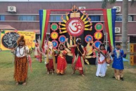 As the City of Joy decks up with dazzling lights, decorative pandals, fragrance of Shiuli flowers, colors, creativity and memories Saini International School is all set to celebrate the Sharodiya Durga Utsav 'AGOMONI, 2023.'  With the beats of the Dhaak in the surrounding air and the sight of Kash phool everywhere, the school has also geared up to sway and tap to the rhythmic sound of Dhunuchi Nach.