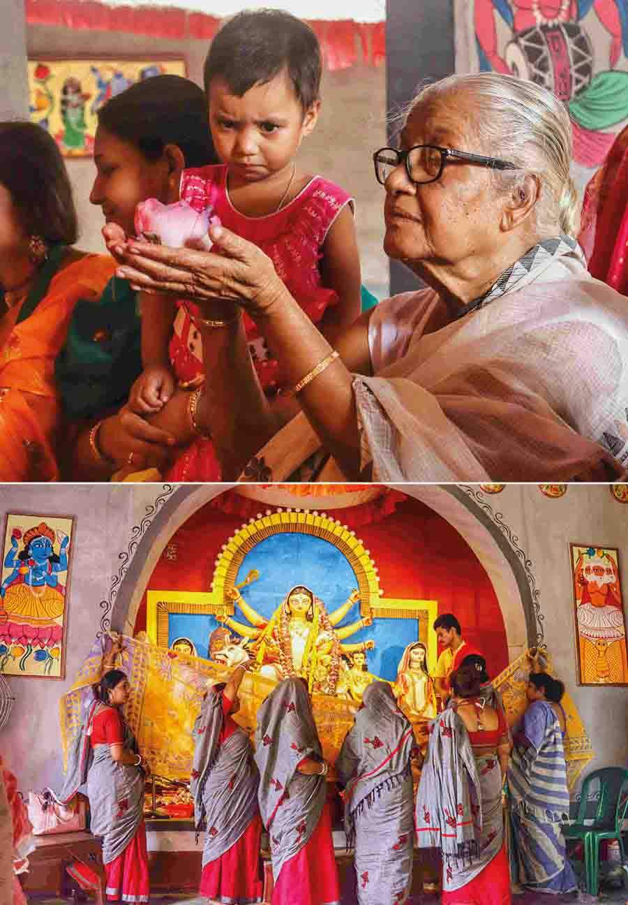 Rituals for Ashtami Puja in progress at Saptasikha Club in Behala 