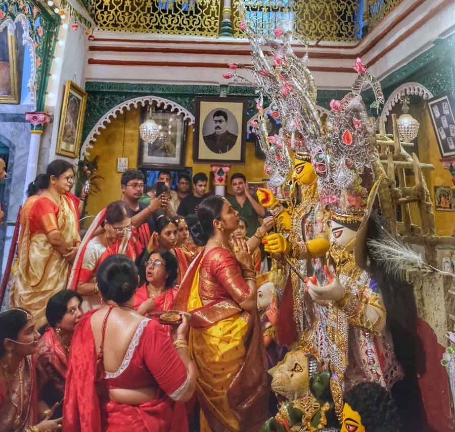 Family members of Daw Bari in Jorasanko take part in ‘Devi boron’  