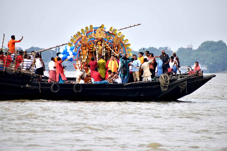 The idol of Sovabazar Rajbari was carried to the middle of river Hooghly in a boat where it was immersed  