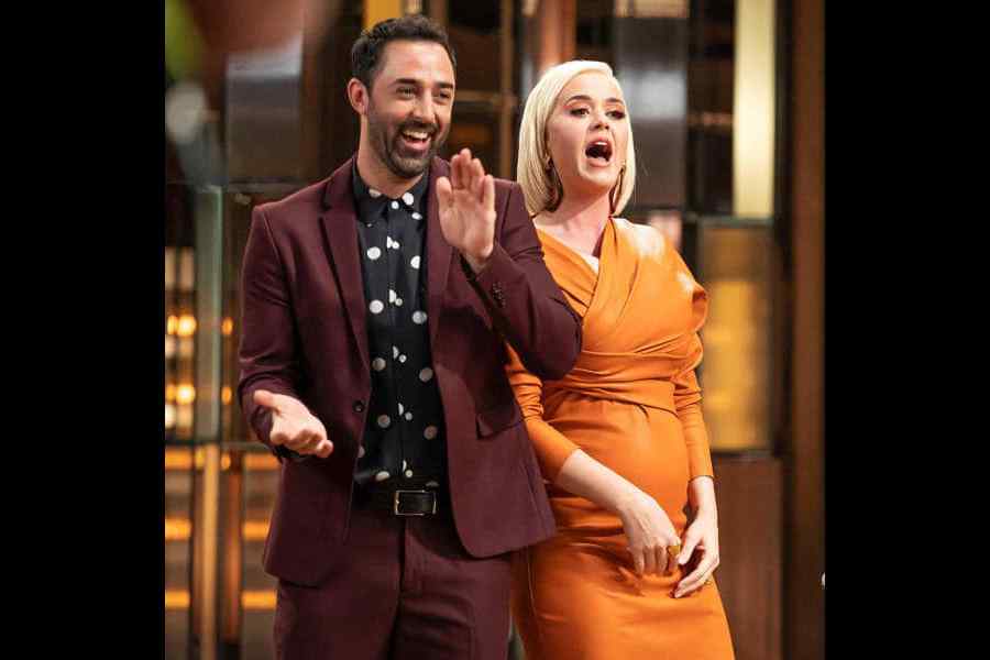 Andy Allen doing judging duties on MasterChef Australia, with guest judge and singer Katy Perry