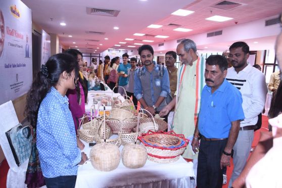 Manoj Singh, member/chairman, East Zone of Khadi and Village Industries Commission (KVIC) surveying the displays 