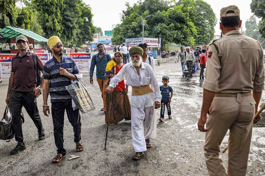 Commuters at the Jammu Railway Station during a strike by All Jammu and Kashmir Transport Welfare Association (AJKTWA) workers