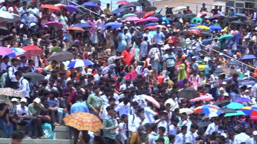 Crowds gather outside the Satish Dhawan Space Centre in Sriharikota