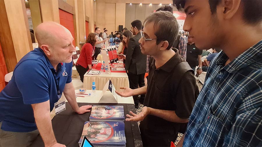 (Left) Jay Ligon interacts with students