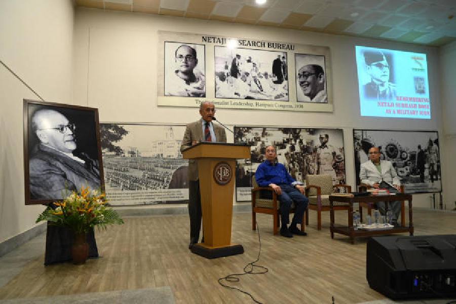 Admiral Arun Prakash, former chief of the Indian Navy, speaks at Netaji Bhavan on Saturday evening. Seated on stage are Sugata Bose and (right) Sumantra Bose