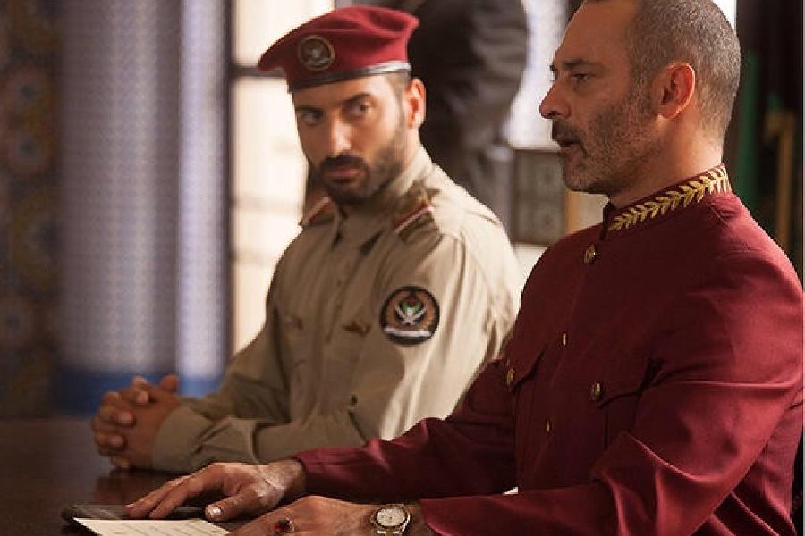 Amir (left) in The Crown