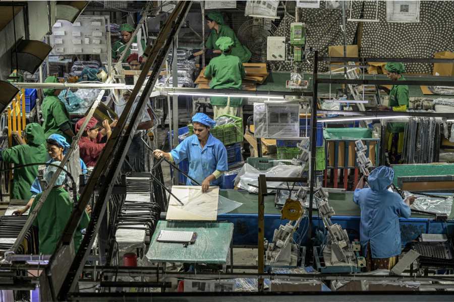 Workers at a furniture factory in Aurangabad, India, on April 18, 2023. India is the world’s fastest-growing major economy, but the masses are still waiting for the prosperity promised by Prime Minister Narendra Modi.