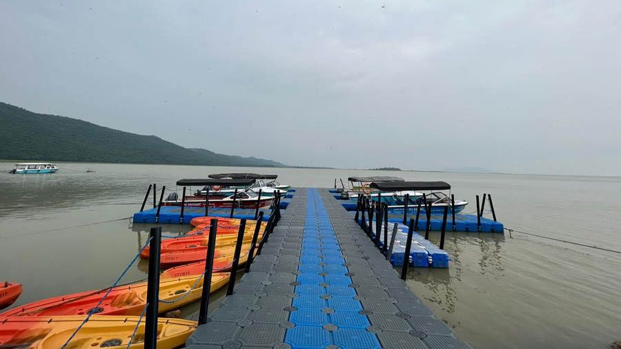 Boats on the jetty at the camp