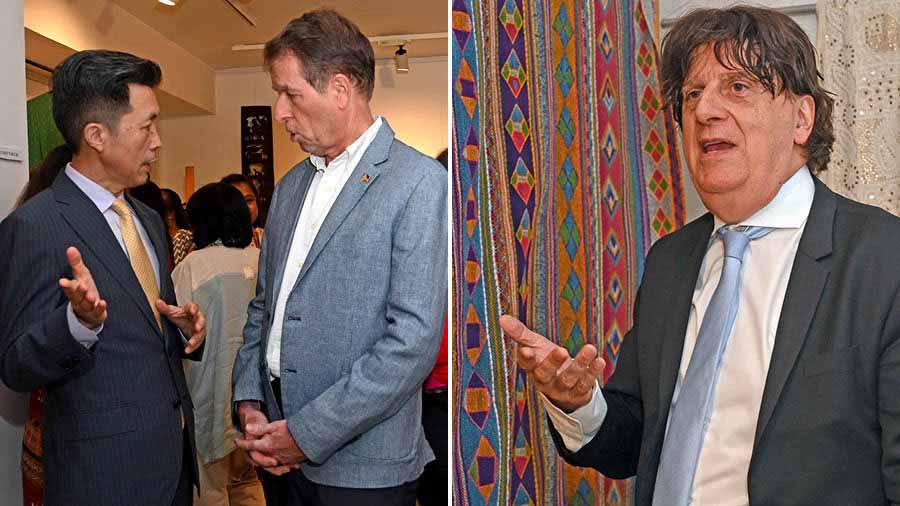 The consuls general of China and Germany in Kolkata, Zha Liyou and Manfred Auster, converse at the CIMA Art in Life preview show and (right) the consul-general of France in Kolkata, Didier Talpain, appreciates the crafts on display