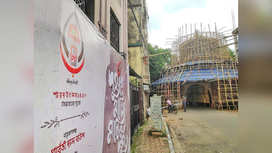 A ‘Sunrise’ board prominently placed near the 66 Palli Durga Puja pandal announces the theme for 2023 