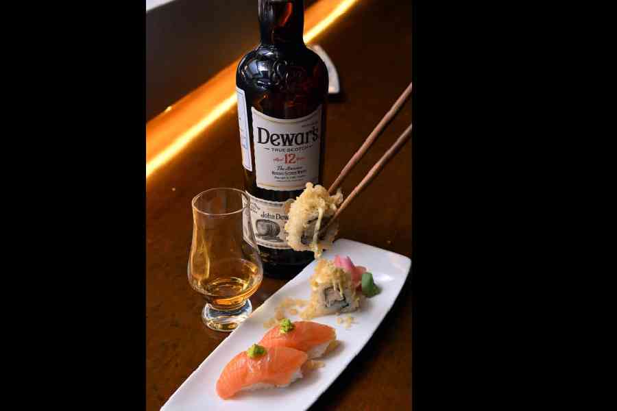 The Salmon Nigiri Sushi was paired with a rich, warm, creamy 12-year Scotch. Sushi was the first course.