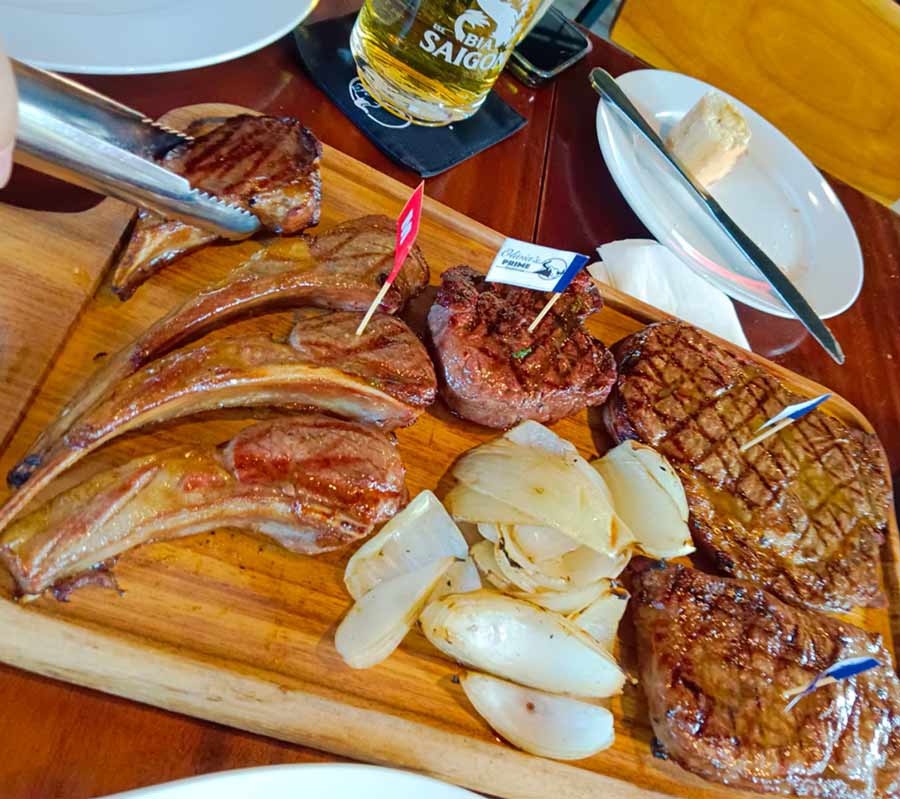 Wagyu Steaks: Can we just take a minute and appreciate this lovely board of meats? This shareable platter was served up in Olivia’s Prime Steakhouse in Hoi An, which came with a grilled fillet, ribeye, striploin and lamb chops. You did not need a knife for these amazing cuts, as the wagyu cuts like butter. When it is medium rare, the meat is smooth to chew, soft, yet crisp, because of the perfect crust. To complete the meal we ordered a side of baked potato and asparagus, which are good palate cleansers. To wrap up the meal, the restaurant gave us a shot of their chocolate vodka with chocolate milk. Yum!