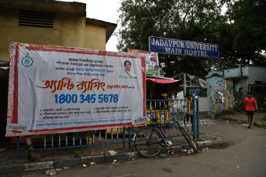 Bengal govt's anti-ragging helpline displayed on a poster outside the JU Main Hostel