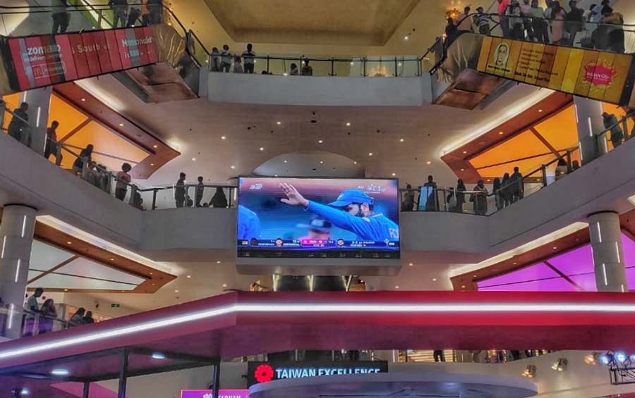 Shoppers at South City Mall catch India and Sri Lanka in action during the rainwashed final of Asia Cup 2023 on Sunday. India won the match by eight wickets to lift the Cup for the eighth time