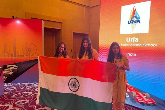 Team Urja holding the Indian Flag during F1 in Schools Championship final.