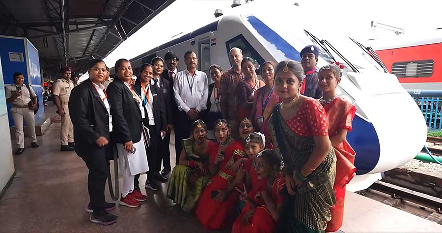 Railway staff and school students pose in front of Jharkhand’s second Vande Bharat Express train on Sunday. The train that will connect Ranchi with Howrah was virtually flagged off by Prime minister Narendra Modi. A Vande Bharat already runs between Ranchi and Patna. The Howrah-Ranchi train will run six days a week and complete the 463km distance in seven hours 