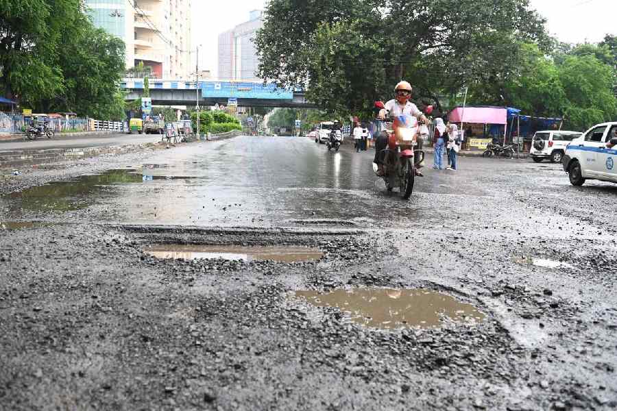 The battered road near EE Block in sector II of Salt Lake on Sunday