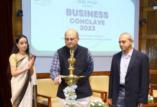 Professor Rishikesha T. Krishnan, Director of IIM Bangalore, lights the ceremonial lamp to inaugurate the EPGP Business Conclave 2023, organized by the EPGP at IIMB