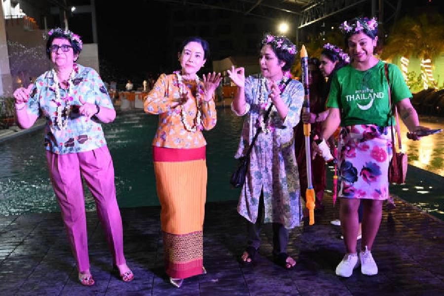 Thai consul general Siriporn Tantipanyathep (second from left) participates in the Songkran festival at a New Town hotel on Saturday