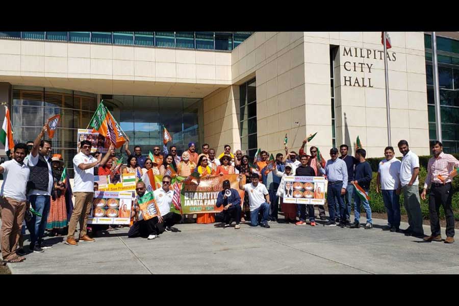 Members and supporters of the Overseas Friends of BJP take part in a car rally in support of Prime Minister Narendra Modi ahead of upcoming Lok Sabha elections in India, in USA.