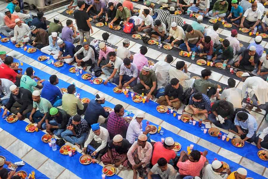 People gathered at the Nakhoda Masjid on Monday evening for Iftar  
