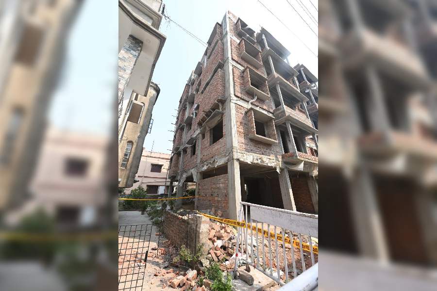 The under-construction building in Birati. Parts of the rooftop wall of the building fell on Keya Sharma Chowdhury on Saturday night, killing her.