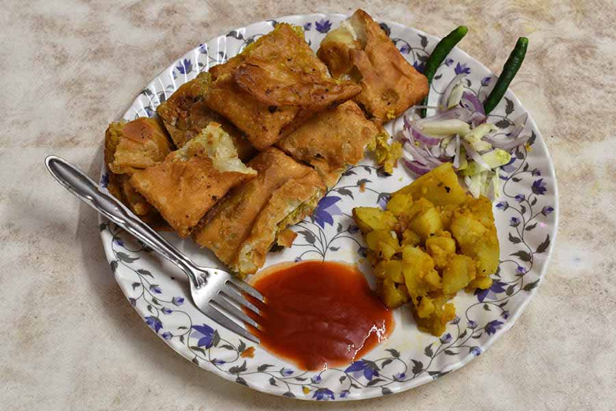 Their menu includes Mughlai Paratha, kosha mangsho and fish fry