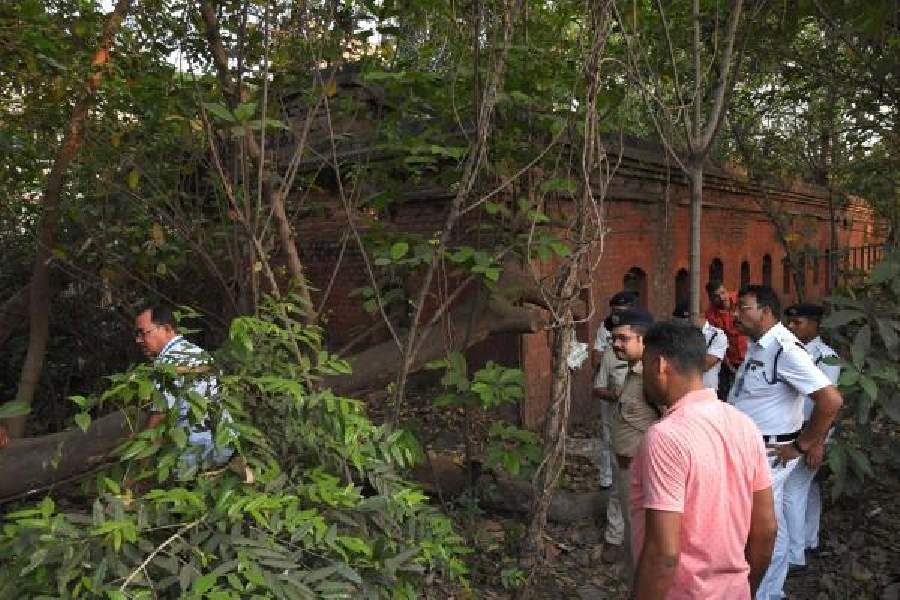Police officers search the abandoned CISF barracks in Watgunge on Tuesday 