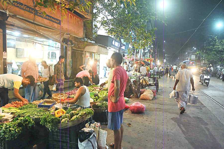 Hawkers' stalls on College Street pavement on Wednesday evening.