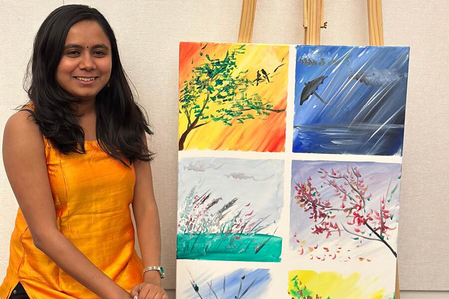 Anchita Addhya, with her live art that she painted during Rabindra Jayanti