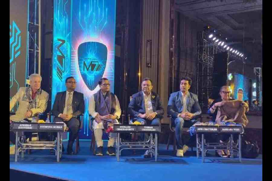 Motovolt M7 was launched by West Bengal transport minister Snehasis Chakraborty (third from left), in the presence of West Bengal transport secretary Soumitra Mohan (left), German consul Barbara Voss (right), actor Abir Chatterjee (second from right), eROCKIT CEO Andreas Zurwehme (second from left), and Motovolt Mobility founder and CEO Tushar Choudhary (third from right)