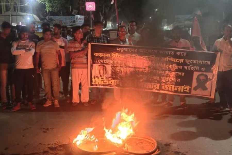 Members of pro-Trinamul faction of the All India Matua Mahasangha led by Mamatabala Thakur burn tyres during a protest rally in Thakurnagar on Monday afternoon.