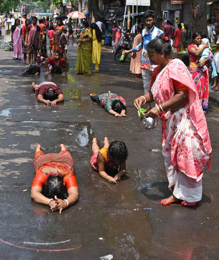 On account of Sitala Puja, devotees performed a ritual called Gondi Kata in Bengali on the road to the Sitala Mata Temple at Scott Lane on Tuesday  