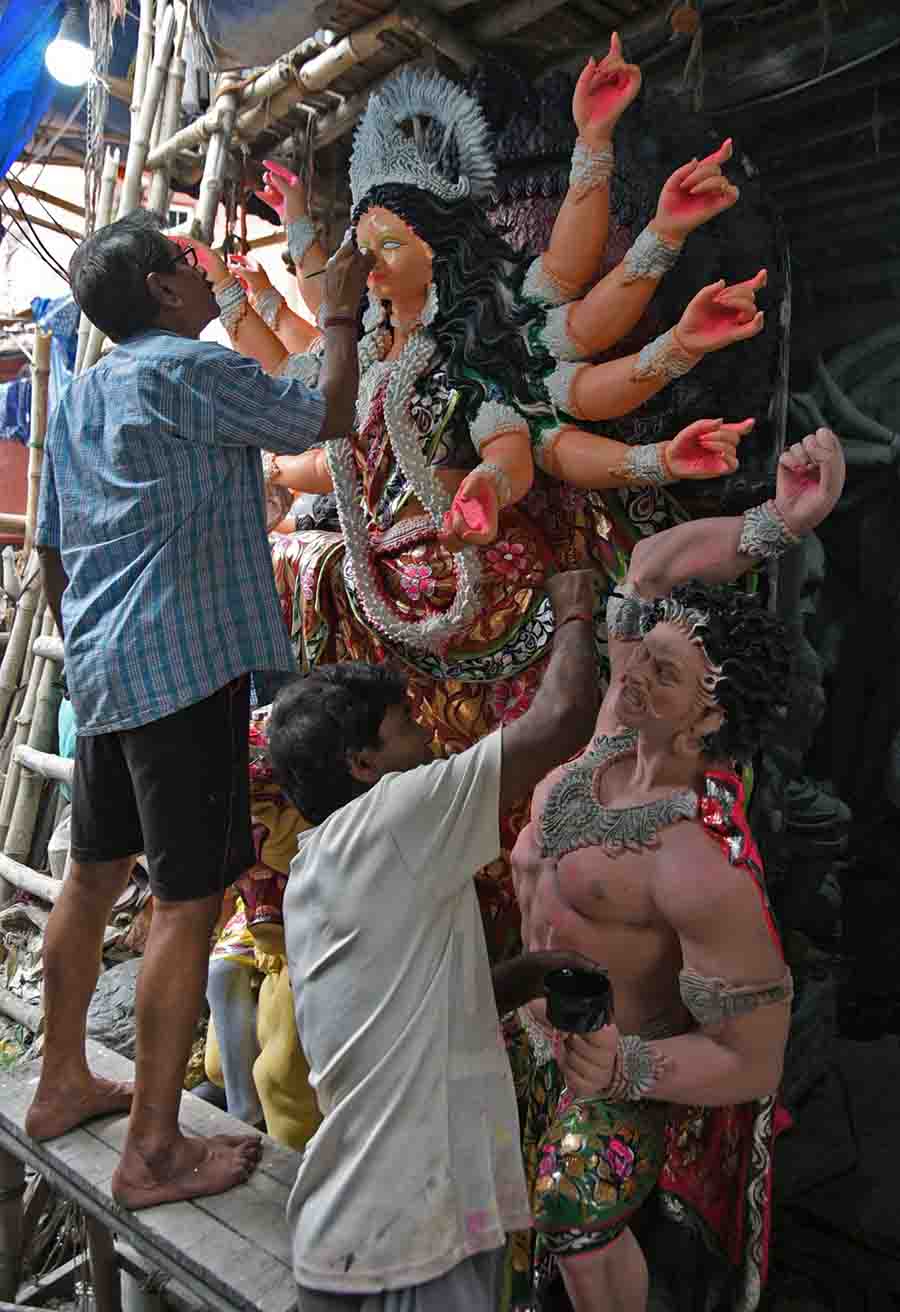 Artists put the touches to an idol for Basanti puja in Kumartuli. This year Basanti Puja falls in the Bengali month of Baisakh (Sashthi falls on April 14)  