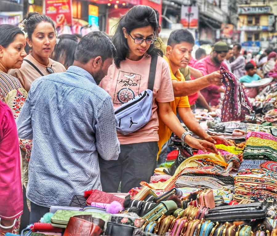 With the Bengali New Year approaching, women shop for clothes and accessories at New Market   