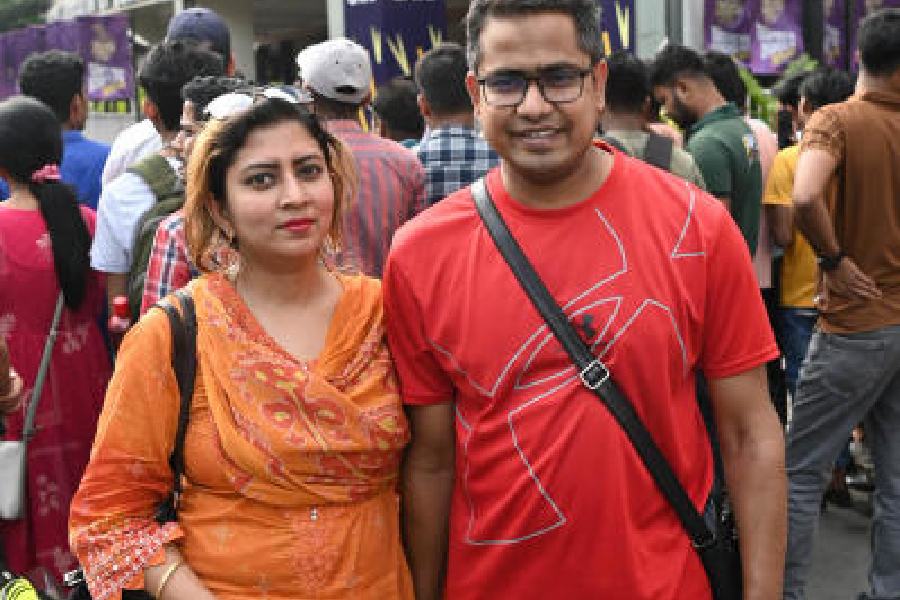 Masudur Rahman with wife Farzana in front of the Eden Gardens on Saturday. They are residents of Mirpur in Bangladesh