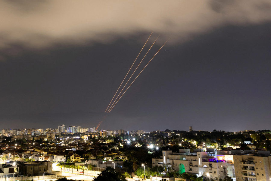 An anti-missile system operates after Iran launched drones and missiles towards Israel, as seen from Ashkelon.